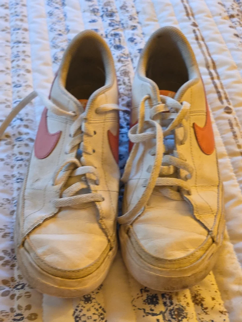 Nike White Low-Top Sneakers with Pink and Orange Swooshes